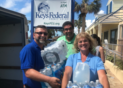 Credit union employees helping after a natural disaster