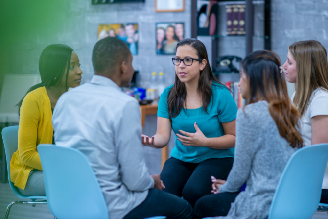 Group of people sitting and talking