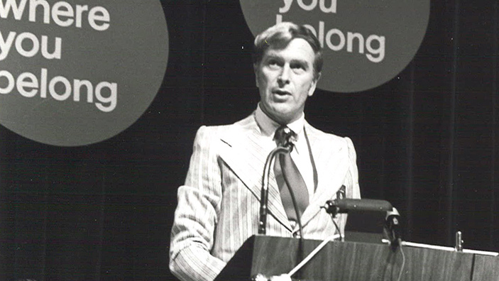 Herb Wegner speaking at an event.