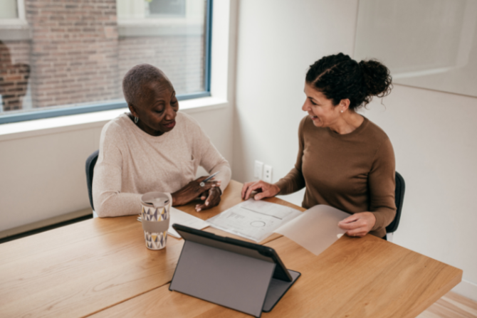 Two women in financial coaching session