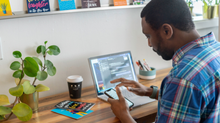 Man sitting at computer at meeting
