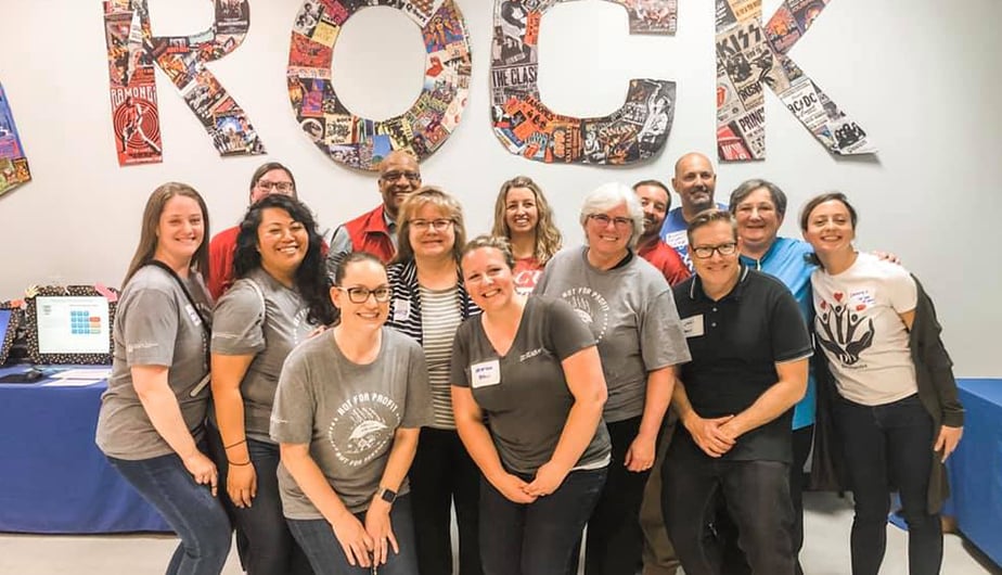 group of people celebrating day of service